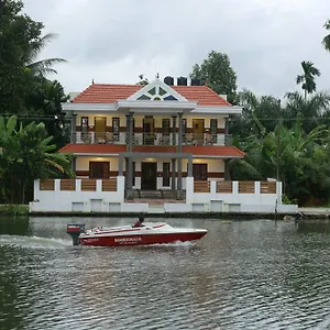 בית אירוח Mango Kerala Homes